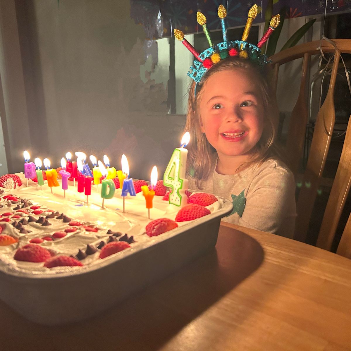 A child celebrating their birthday with mindfully chosen gifts